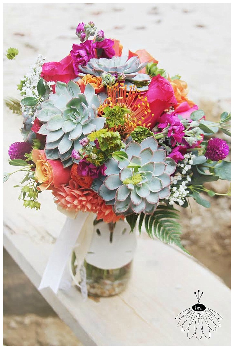 little miss lovely succulent bouquet with sand dollar