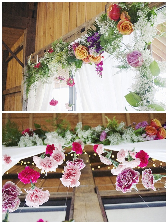 little miss lovely floral design // ceremony backdrop // hanging carnations with curtains and baby's breath // white barn wedding